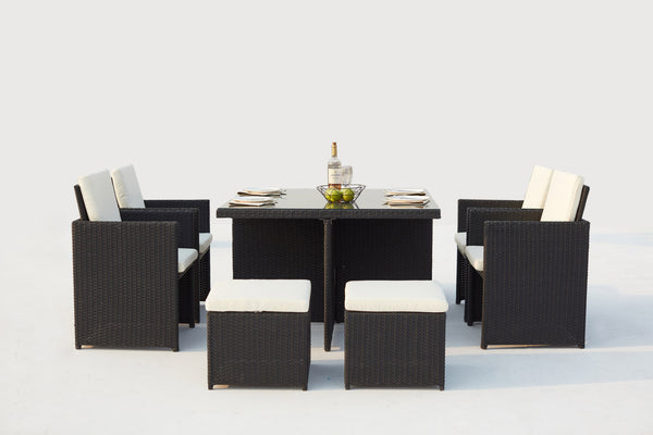Table et chaises 8 places encastrables en résine noir/blanc DALMA
